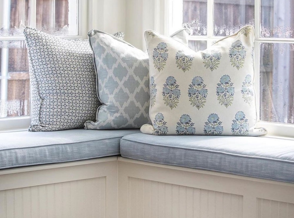 Add patterned throw pillow for edginess