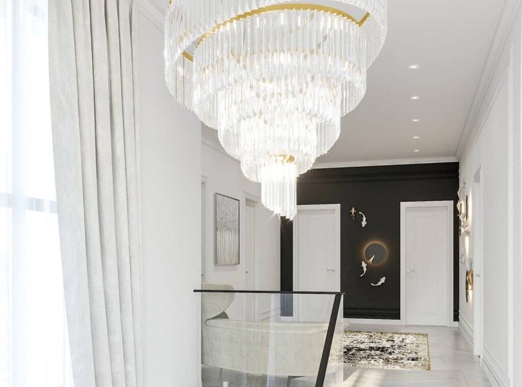 Complement the chandelier with the color and materials of the space